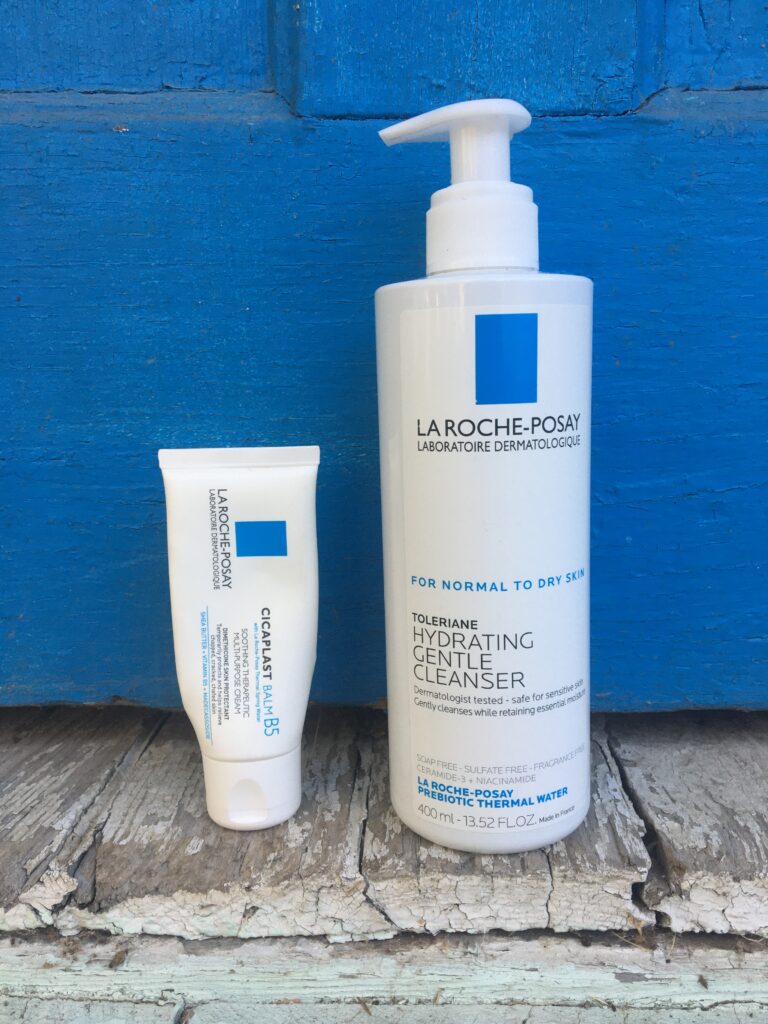 Is La Roche-Posay Good? Blue back ground with the La Roche Cleanser and Cicaplast Balm. 