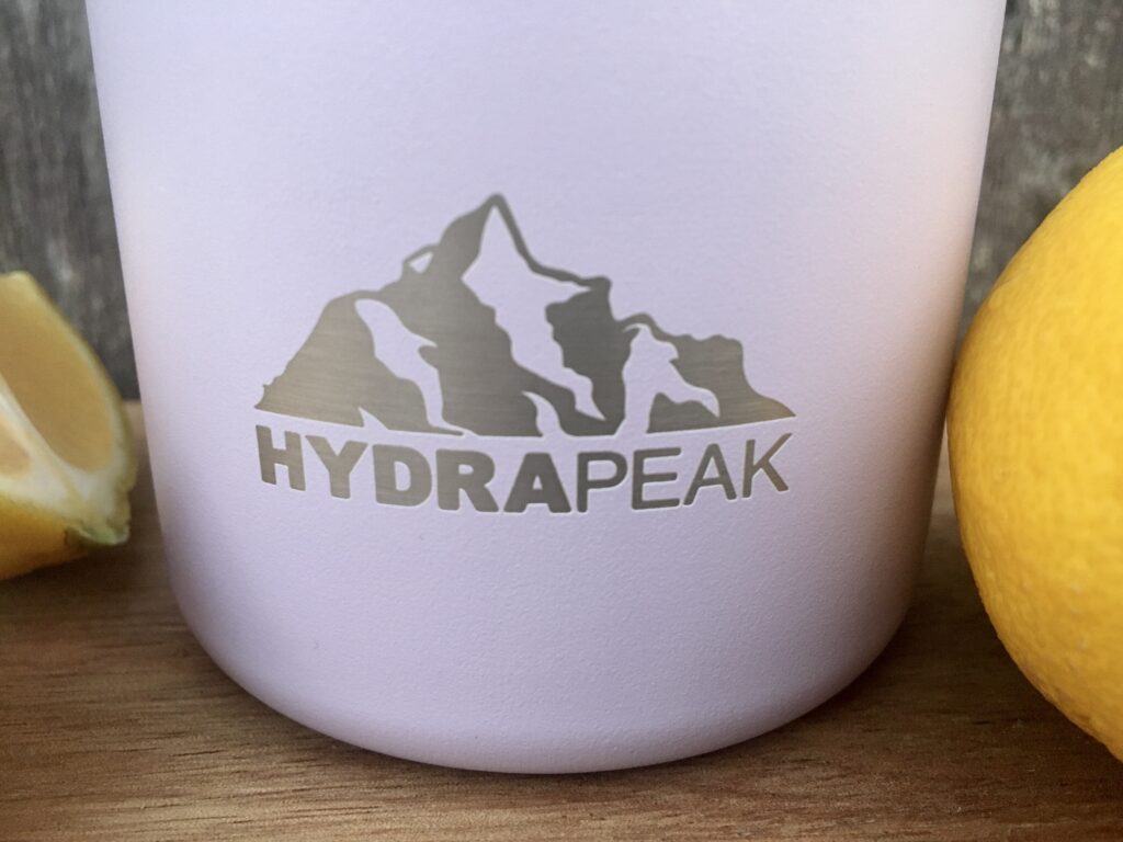 Hydrapeak water bottle logo close up shot of the mountain on the bottle. 