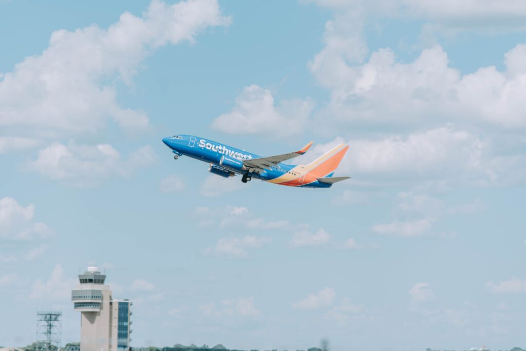 A Southwest airplane in the air. Southwest companion pass promotion.